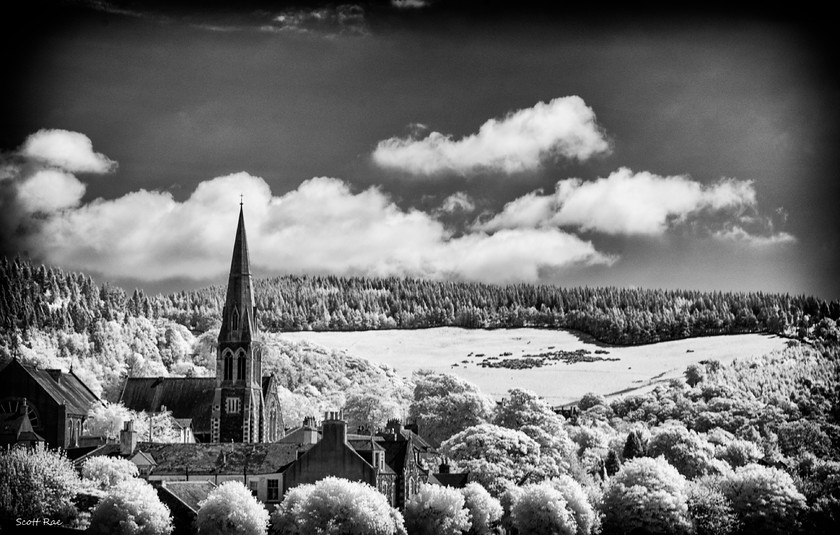 St Andrews Leckie Church from Tweed Bridge in Infrared 
 Keywords: Peebles Borders hills scotland church summer infrared b&w town trees