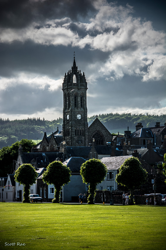 Parish Church of Peebles from Tweed Green 
 Keywords: Peebles Borders hills scotland summer church town trees