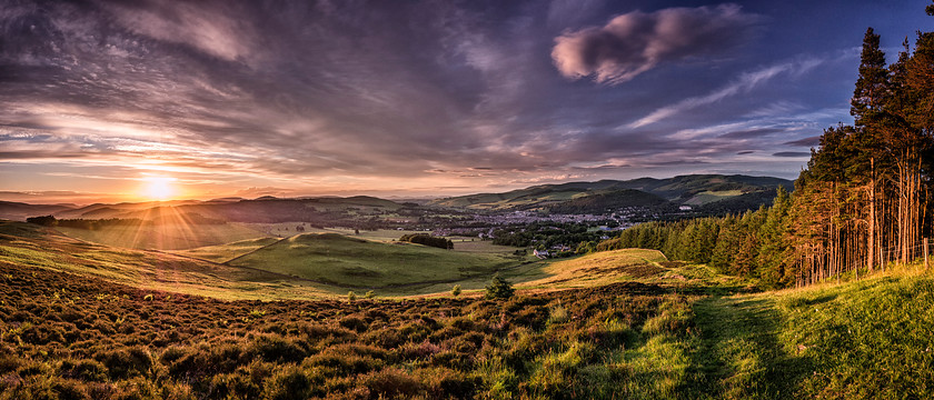 Sunset on the EU 
 Keywords: peebles scotland borders town sunset summer panorama hills trees