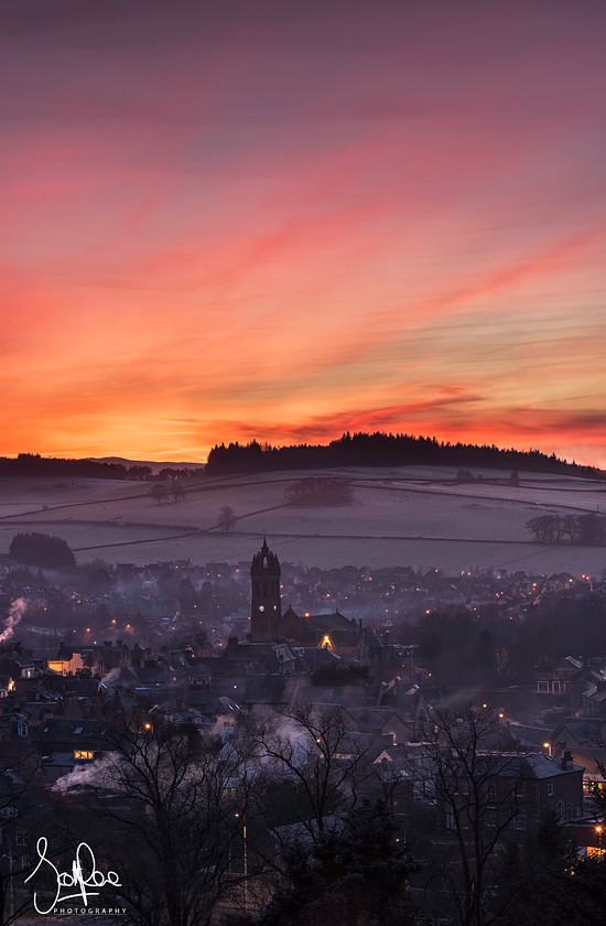 Just in time for Sunset 
 Keywords: sunset peebles town church scotland borders winter slpoty hills